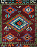 Vintage kilim rug in room decor setting, old rug, antique rug, pastel colors, faded colors, Turkish rug, vintage rug, soft rug, Portland, Oregon, rug store, rug shop, local shop, antique kilim rug, bold colors, bright colors, faded colors