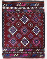 Vintage kilim rug in room decor setting, old rug, antique rug, pastel colors, faded colors, Turkish rug, vintage rug, soft rug, Portland, Oregon, rug store, rug shop, local shop, antique kilim rug, bold colors, bright colors, faded colors