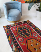 Vintage Turkish runner rug in a living room setting, pile rug, Turkish rug, vintage rug, portland, rug shop, bright colors, wild shaman, soft rug, bold color, Portland, Oregon, rug store, rug shop, local shop