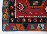 Vintage Turkish runner rug in a living room setting, pile rug, Turkish rug, vintage rug, portland, rug shop, bright colors, wild shaman, soft rug, bold color, Portland, Oregon, rug store, rug shop, local shop