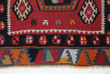 Vintage Turkish runner rug in a living room setting, pile rug, Turkish rug, vintage rug, portland, rug shop, bright colors, wild shaman, soft rug, bold color, Portland, Oregon, rug store, rug shop, local shop