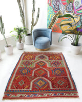 Vintage kilim rug in living room setting, bright colors, wild shaman, soft rug, bold color, Portland, Oregon, rug store, rug shop, local shop, vintage rug, modern kilim, warm colors, antique rug, antique kilim