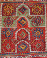 Vintage kilim rug in living room setting, bright colors, wild shaman, soft rug, bold color, Portland, Oregon, rug store, rug shop, local shop, vintage rug, modern kilim, warm colors, antique rug, antique kilim