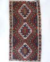 Vintage kilim rug in living room setting, bright colors, wild shaman, soft rug, bold color, Portland, Oregon, rug store, rug shop, local shop, vintage rug, modern kilim, warm colors, antique rug, antique kilim