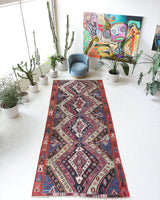 Vintage kilim rug in living room setting, old rug, antique rug, pastel colors, faded colors, Turkish rug, vintage rug, soft rug, Portland, Oregon, rug store, rug shop, local shop, earthy tones, earthy colors, warm colors