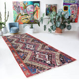 Vintage kilim rug in living room setting, old rug, antique rug, pastel colors, faded colors, Turkish rug, vintage rug, soft rug, Portland, Oregon, rug store, rug shop, local shop, earthy tones, earthy colors, warm colors