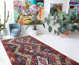 Vintage kilim rug in living room setting, old rug, antique rug, pastel colors, faded colors, Turkish rug, vintage rug, soft rug, Portland, Oregon, rug store, rug shop, local shop, earthy tones, earthy colors, warm colors