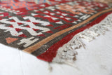 Vintage kilim rug in living room setting, bright colors, wild shaman, soft rug, bold color, Portland, Oregon, rug store, rug shop, local shop, vintage rug, modern kilim, warm colors, antique rug, antique kilim