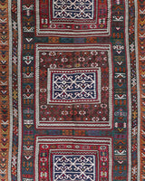 Vintage kilim rug in living room setting, bright colors, wild shaman, soft rug, bold color, Portland, Oregon, rug store, rug shop, local shop, vintage rug, modern kilim, warm colors, antique rug, antique kilim