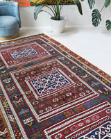 Vintage kilim rug in living room setting, bright colors, wild shaman, soft rug, bold color, Portland, Oregon, rug store, rug shop, local shop, vintage rug, modern kilim, warm colors, antique rug, antique kilim