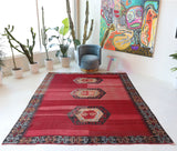 Vintage kilim rug in living room setting, bright colors, wild shaman, soft rug, bold color, Portland, Oregon, rug store, rug shop, local shop, vintage rug, modern kilim, warm colors, antique kilim rug