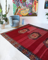 Vintage kilim rug in living room setting, bright colors, wild shaman, soft rug, bold color, Portland, Oregon, rug store, rug shop, local shop, vintage rug, modern kilim, warm colors, antique kilim rug