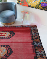 Vintage kilim rug in living room setting, bright colors, wild shaman, soft rug, bold color, Portland, Oregon, rug store, rug shop, local shop, vintage rug, modern kilim, warm colors, antique kilim rug