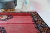 Vintage kilim rug in living room setting, bright colors, wild shaman, soft rug, bold color, Portland, Oregon, rug store, rug shop, local shop, vintage rug, modern kilim, warm colors, antique kilim rug
