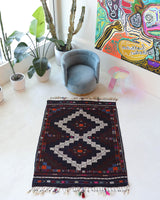 Vintage kilim rug in living room setting, bright colors, wild shaman, soft rug, bold color, Portland, Oregon, rug store, rug shop, local shop, vintage rug, modern kilim, warm colors, antique kilim rug