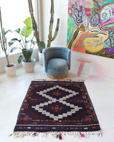 Vintage kilim rug in living room setting, bright colors, wild shaman, soft rug, bold color, Portland, Oregon, rug store, rug shop, local shop, vintage rug, modern kilim, warm colors, antique kilim rug