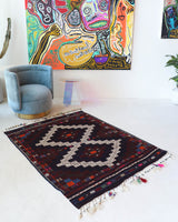 Vintage kilim rug in living room setting, bright colors, wild shaman, soft rug, bold color, Portland, Oregon, rug store, rug shop, local shop, vintage rug, modern kilim, warm colors, antique kilim rug