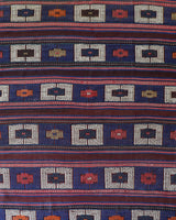 Vintage kilim rug in living room setting, old rug, antique rug, pastel colors, faded colors, Turkish rug, vintage rug, soft rug, Portland, Oregon, rug store, rug shop, local shop, earthy tones, earthy colors, warm colors