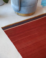 Vintage kilim rug in living room setting, bright colors, wild shaman, soft rug, bold color, Portland, Oregon, rug store, rug shop, local shop, vintage rug, modern kilim, warm colors, antique kilim rug