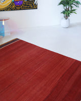 Vintage kilim rug in living room setting, bright colors, wild shaman, soft rug, bold color, Portland, Oregon, rug store, rug shop, local shop, vintage rug, modern kilim, warm colors, antique kilim rug