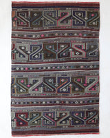 Vintage kilim rug in living room setting, bright colors, wild shaman, soft rug, bold color, Portland, Oregon, rug store, rug shop, local shop, vintage rug, modern kilim, warm colors, antique kilim rug