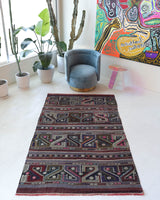 Vintage kilim rug in living room setting, bright colors, wild shaman, soft rug, bold color, Portland, Oregon, rug store, rug shop, local shop, vintage rug, modern kilim, warm colors, antique kilim rug