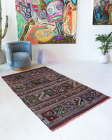 Vintage kilim rug in living room setting, bright colors, wild shaman, soft rug, bold color, Portland, Oregon, rug store, rug shop, local shop, vintage rug, modern kilim, warm colors, antique kilim rug