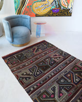 Vintage kilim rug in living room setting, bright colors, wild shaman, soft rug, bold color, Portland, Oregon, rug store, rug shop, local shop, vintage rug, modern kilim, warm colors, antique kilim rug