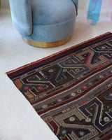Vintage kilim rug in living room setting, bright colors, wild shaman, soft rug, bold color, Portland, Oregon, rug store, rug shop, local shop, vintage rug, modern kilim, warm colors, antique kilim rug