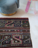 Vintage kilim rug in living room setting, bright colors, wild shaman, soft rug, bold color, Portland, Oregon, rug store, rug shop, local shop, vintage rug, modern kilim, warm colors, antique kilim rug