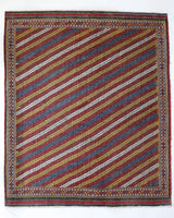 Vintage kilim rug in living room setting, old rug, antique rug, pastel colors, faded colors, Turkish rug, vintage rug, soft rug, Portland, Oregon, rug store, rug shop, local shop, earthy tones, earthy colors, warm colors