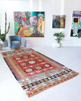 Vintage kilim rug in living room setting, bright colors, wild shaman, soft rug, bold color, Portland, Oregon, rug store, rug shop, local shop, vintage rug, modern kilim, warm colors, antique kilim rug