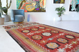 Vintage kilim rug in living room setting, bright colors, wild shaman, soft rug, bold color, Portland, Oregon, rug store, rug shop, local shop, vintage rug, modern kilim, warm colors, antique kilim rug