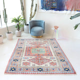 Vintage Turkish rug in living room setting, old rug, antique rug, pastel colors, faded colors, Turkish rug, vintage rug, soft rug, Portland, Oregon, rug store, rug shop, local shop