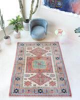 Vintage Turkish rug in living room setting, old rug, antique rug, pastel colors, faded colors, Turkish rug, vintage rug, soft rug, Portland, Oregon, rug store, rug shop, local shop