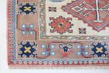 Vintage Turkish rug in living room setting, old rug, antique rug, pastel colors, faded colors, Turkish rug, vintage rug, soft rug, Portland, Oregon, rug store, rug shop, local shop