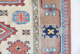 Vintage Turkish rug in living room setting, old rug, antique rug, pastel colors, faded colors, Turkish rug, vintage rug, soft rug, Portland, Oregon, rug store, rug shop, local shop