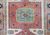 Vintage Turkish rug in living room setting, old rug, antique rug, pastel colors, faded colors, Turkish rug, vintage rug, soft rug, Portland, Oregon, rug store, rug shop, local shop