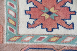 Vintage Turkish rug in living room setting, old rug, antique rug, pastel colors, faded colors, Turkish rug, vintage rug, soft rug, Portland, Oregon, rug store, rug shop, local shop