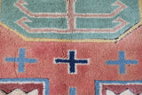 Vintage Turkish rug in living room setting, old rug, antique rug, pastel colors, faded colors, Turkish rug, vintage rug, soft rug, Portland, Oregon, rug store, rug shop, local shop