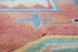 Vintage Turkish rug in living room setting, old rug, antique rug, pastel colors, faded colors, Turkish rug, vintage rug, soft rug, Portland, Oregon, rug store, rug shop, local shop
