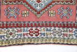 Vintage Turkish rug in living room setting, old rug, antique rug, pastel colors, faded colors, Turkish rug, vintage rug, soft rug, Portland, Oregon, rug store, rug shop, local shop