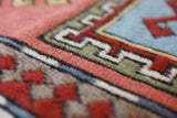 Vintage Turkish rug in living room setting, old rug, antique rug, pastel colors, faded colors, Turkish rug, vintage rug, soft rug, Portland, Oregon, rug store, rug shop, local shop