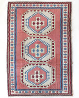 Vintage Turkish rug in a living room setting, pile rug, Turkish rug, vintage rug, portland, rug shop, bright colors, wild shaman, soft rug, bold color, Portland, Oregon, rug store, rug shop, local shop, antique rug