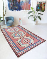 Vintage Turkish rug in a living room setting, pile rug, Turkish rug, vintage rug, portland, rug shop, bright colors, wild shaman, soft rug, bold color, Portland, Oregon, rug store, rug shop, local shop, antique rug