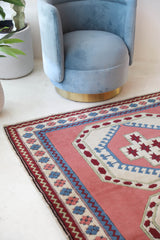 Vintage Turkish rug in a living room setting, pile rug, Turkish rug, vintage rug, portland, rug shop, bright colors, wild shaman, soft rug, bold color, Portland, Oregon, rug store, rug shop, local shop, antique rug
