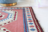 Vintage Turkish rug in a living room setting, pile rug, Turkish rug, vintage rug, portland, rug shop, bright colors, wild shaman, soft rug, bold color, Portland, Oregon, rug store, rug shop, local shop, antique rug