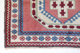 Vintage Turkish rug in a living room setting, pile rug, Turkish rug, vintage rug, portland, rug shop, bright colors, wild shaman, soft rug, bold color, Portland, Oregon, rug store, rug shop, local shop, antique rug