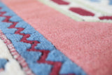 Vintage Turkish rug in a living room setting, pile rug, Turkish rug, vintage rug, portland, rug shop, bright colors, wild shaman, soft rug, bold color, Portland, Oregon, rug store, rug shop, local shop, antique rug