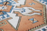 Vintage Turkish rug in living room setting, old rug, antique rug, pastel colors, faded colors, Turkish rug, vintage rug, soft rug, Portland, Oregon, rug store, rug shop, local shop